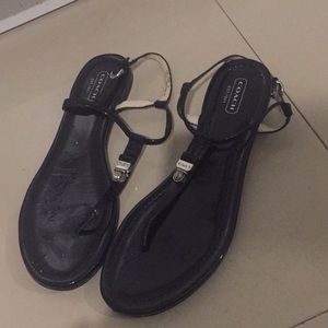 Black coach flats with silver accents